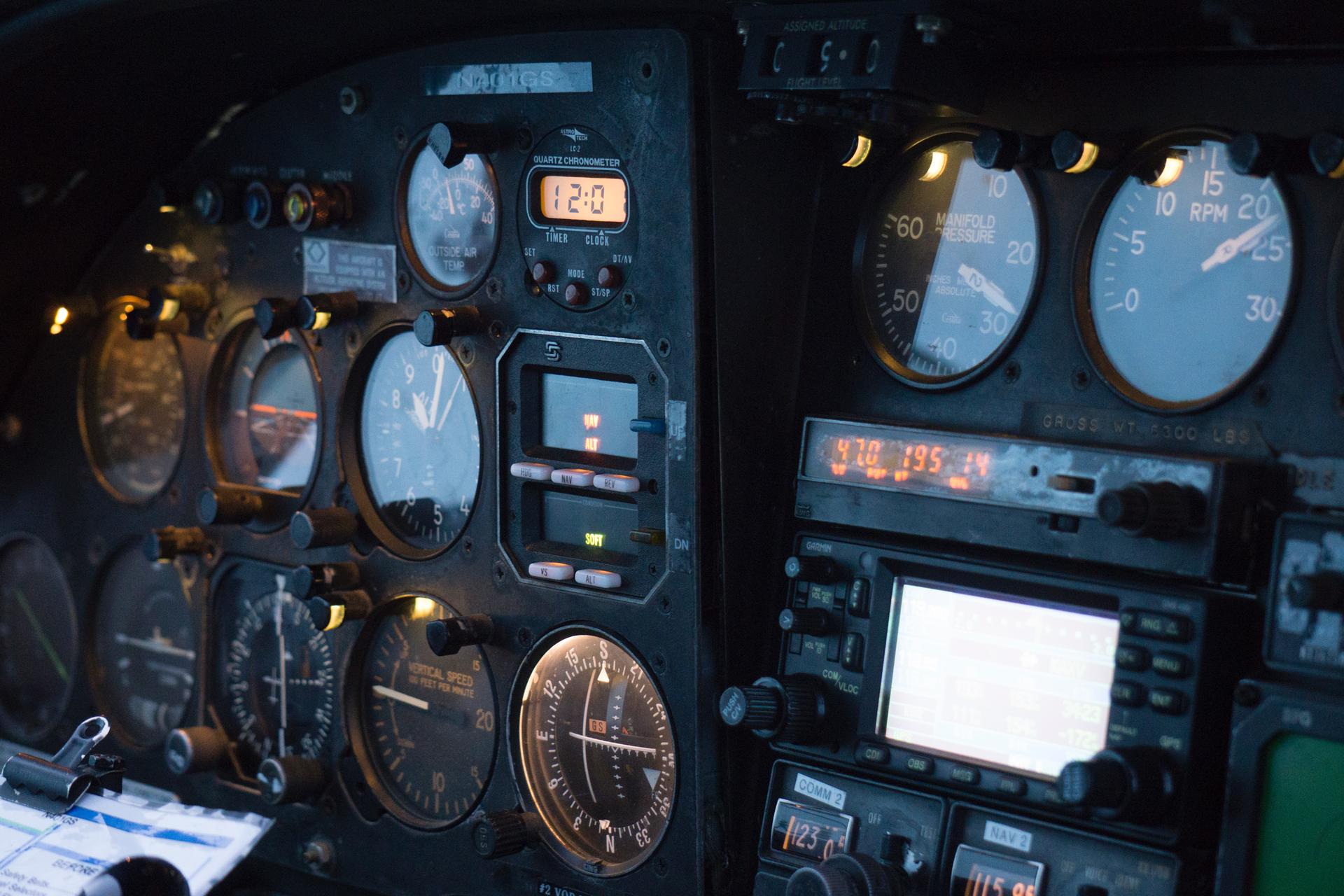 An aeroplane cockpit showing instruments for displaying system statuses